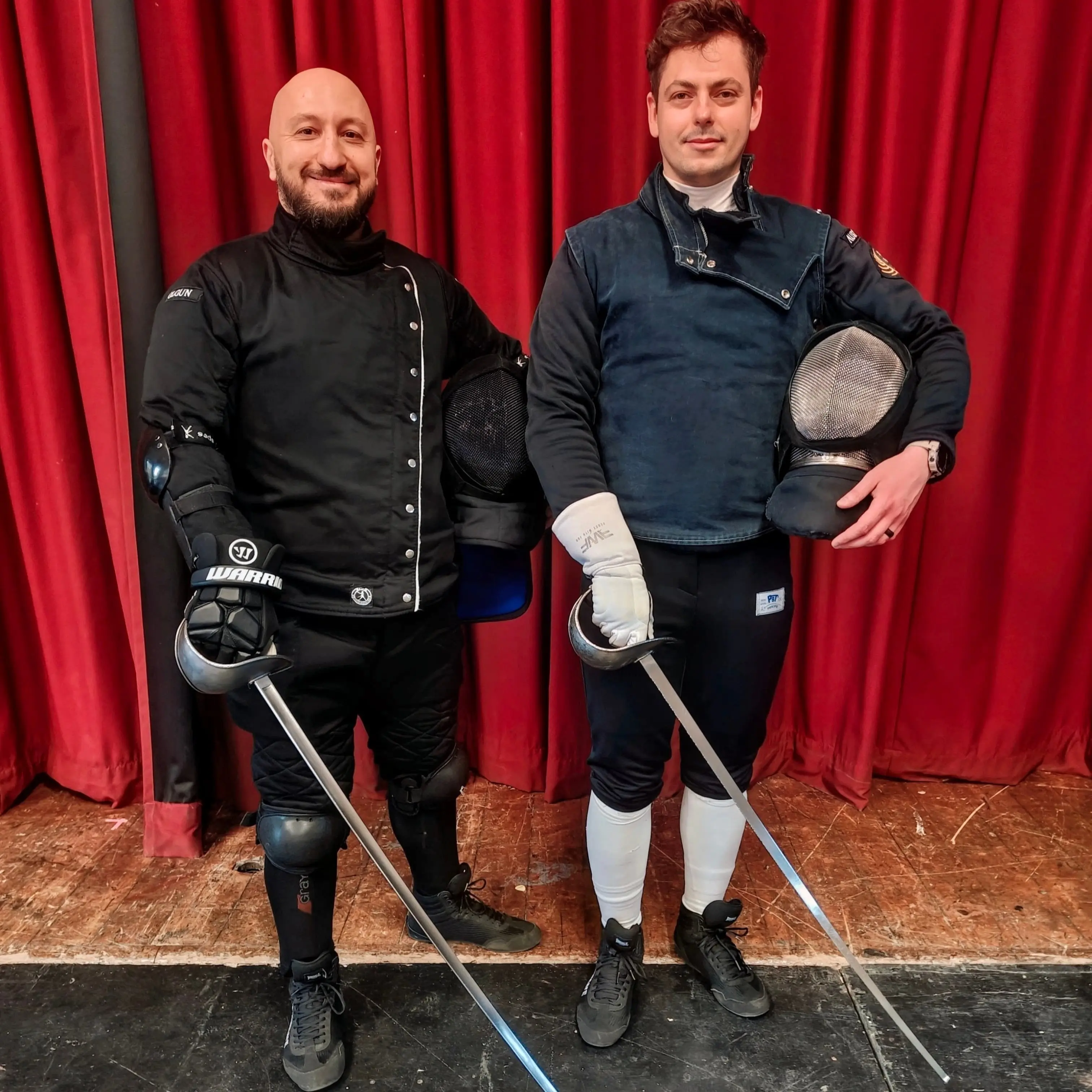 Olgun Tiltay learning Sabre from Pedro San Miguel  HEMA instructor in Ausardia